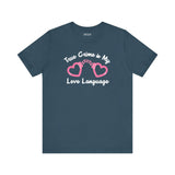 True Crime is My Love Language T Shirt featuring heart-shaped handcuffs design, perfect for true crime enthusiasts.