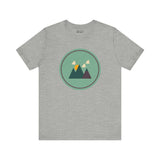 Minimalist Northwest style tee with forest silhouette, gray shirt, nature-inspired design, ideal for adventure seekers and nature lovers.