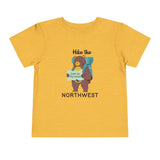 Hike the Northwest toddler tee featuring a bear with a backpack and map saying 'leave the city behind'.