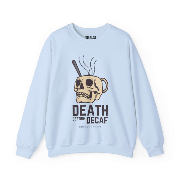 Light blue sweatshirt featuring a skull coffee mug design with text "Death Before Decaf" for passionate coffee lovers.