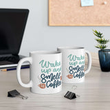 Wake Up and Smell the Coffee Mug displayed on a desk, featuring colorful lettering and a glossy ceramic finish.
