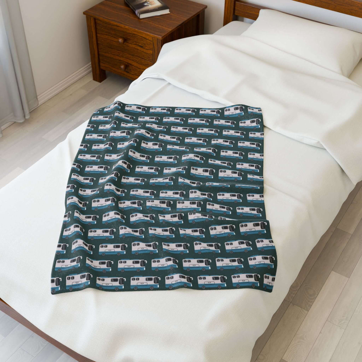 Highway Hideaway Class A Motorhome Lightweight Cozy Blanket spread on a bed, perfect for RV adventures and cozy living.