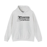 Homegrown in the Couve cozy hoodie with illustrated axe design, showcasing local pride and craftsmanship.