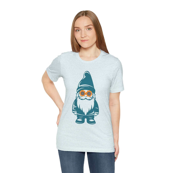 Woman wearing a teal tee with a cool gnome in daisy sunglasses design, adding whimsy to a PNW-inspired outfit.