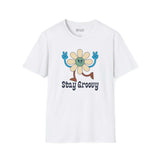 Stay Groovy T Shirt featuring a vibrant retro flower design and playful peace sign symbols.