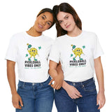 Two women wearing Pickleball Vibes Only T Shirt featuring retro pickleball character design.