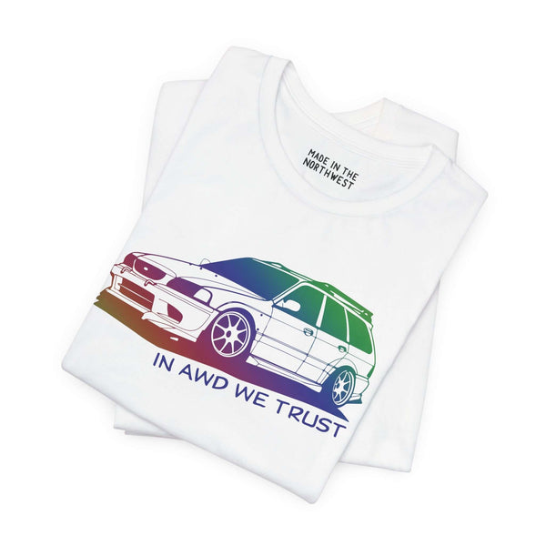 White premium soft tee featuring a slammed Subaru WRX wagon design with text 'IN AWD WE TRUST'.