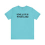 Home Is in Portland tee showcasing a blue shirt with illustrations and text emphasizing Rose City Pride.