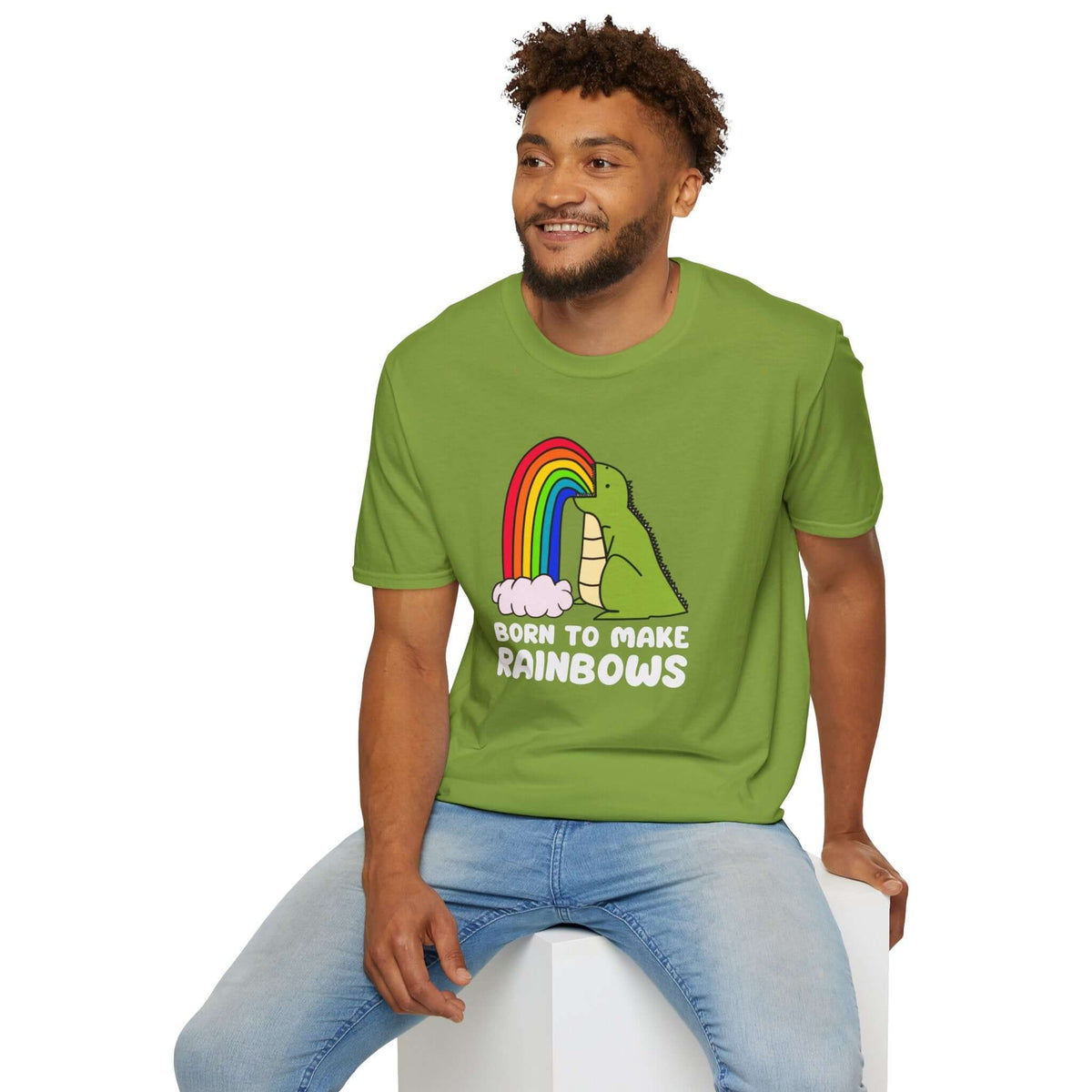 Born to Make Rainbows dinosaur t-shirt in green, featuring a dinosaur with a rainbow, perfect for fun and individuality.