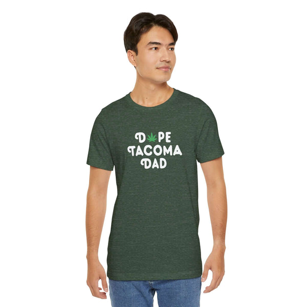 Dope Tacoma Dad soft tee with green background and playful marijuana leaf design, perfect for cool dads in Washington.