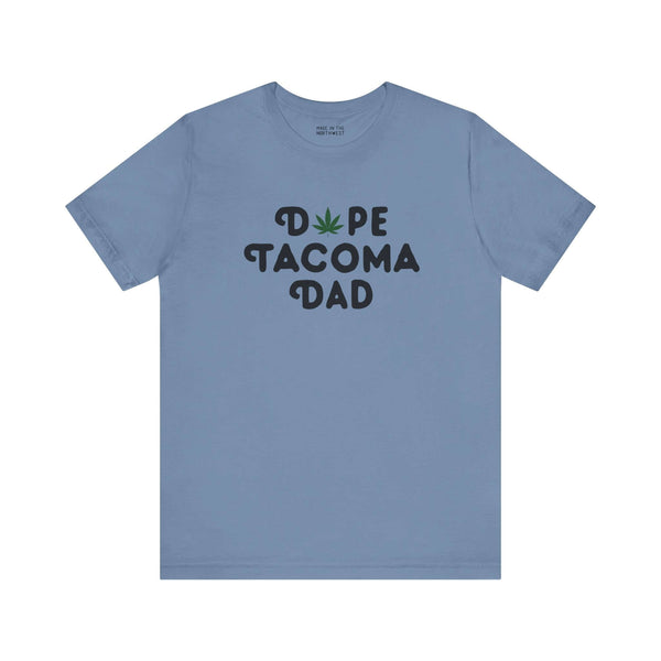 Blue "Dope Tacoma Dad" t-shirt with marijuana leaf design for stylish dads in Grit City, Washington.