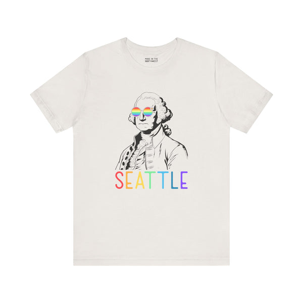George's Rainbow Vision Seattle tee featuring George Washington in rainbow glasses and colorful 'Seattle' lettering.