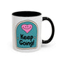 Keep Going Mug featuring a whimsical design with a smiling heart and hand-lettered message.