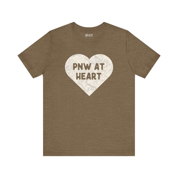 Olive green tee with "PNW at Heart" printed on a heart-shaped map, symbolizing love for the Pacific Northwest.