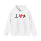 Peace, Love, and Bigfoot Cozy Hoodie features peace sign, heart, and Bigfoot graphic on a cozy white sweatshirt.
