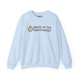 Light blue Made in the Northwest Sweatshirt featuring a compass graphic and logo.