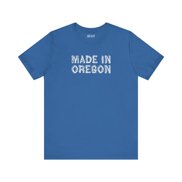 Blue premium soft tee featuring "Made in Oregon" in rustic log font, ideal for outdoor enthusiasts.