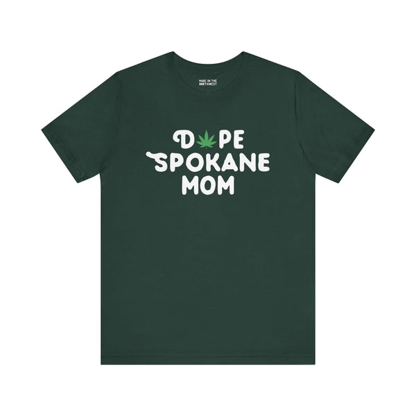 "Dope Spokane Mom soft tee with marijuana leaf design on dark green fabric, perfect for stylish moms in Washington state."