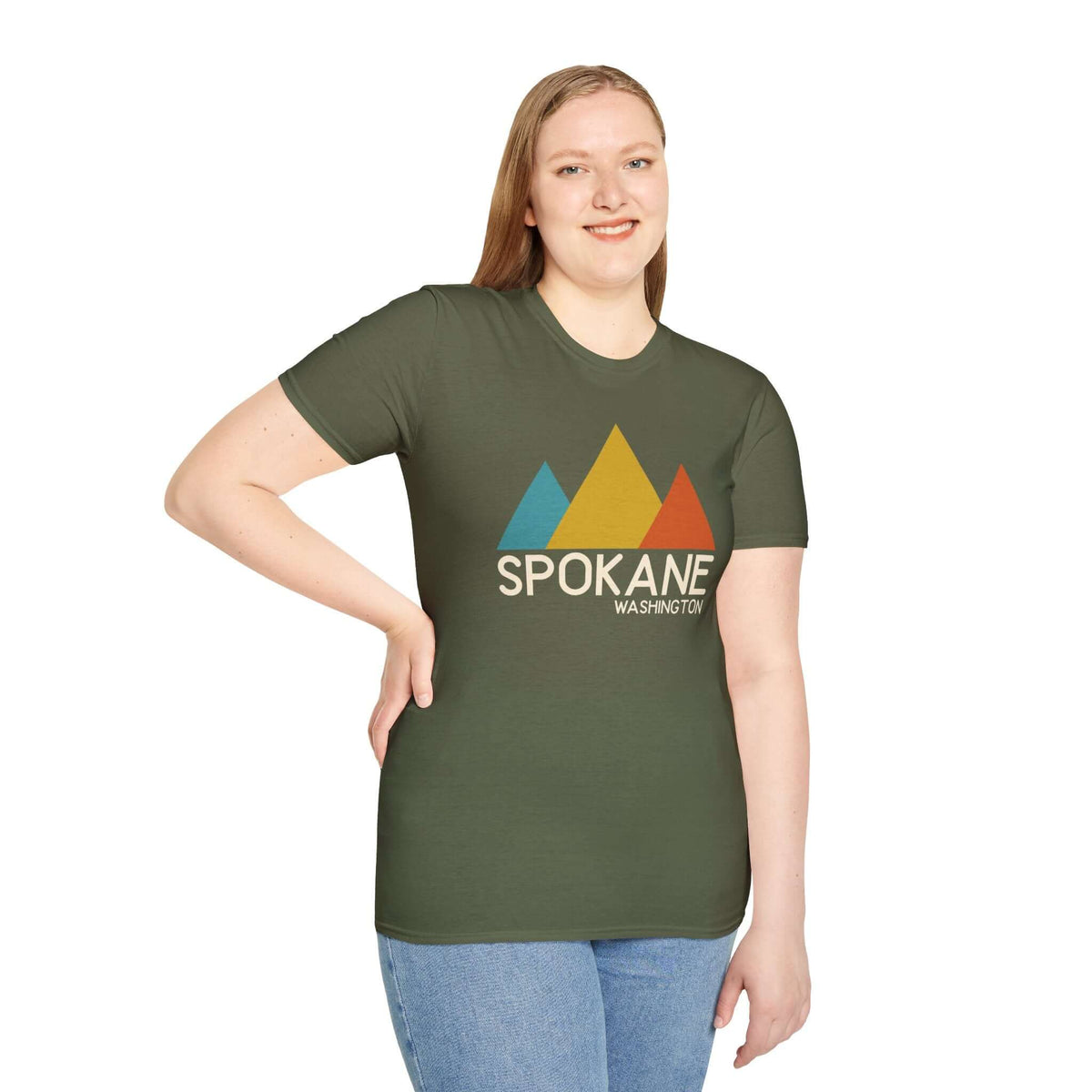 Modern Peaks Spokane T Shirt featuring a vibrant mountain design and Spokane, Washington text on a green background.