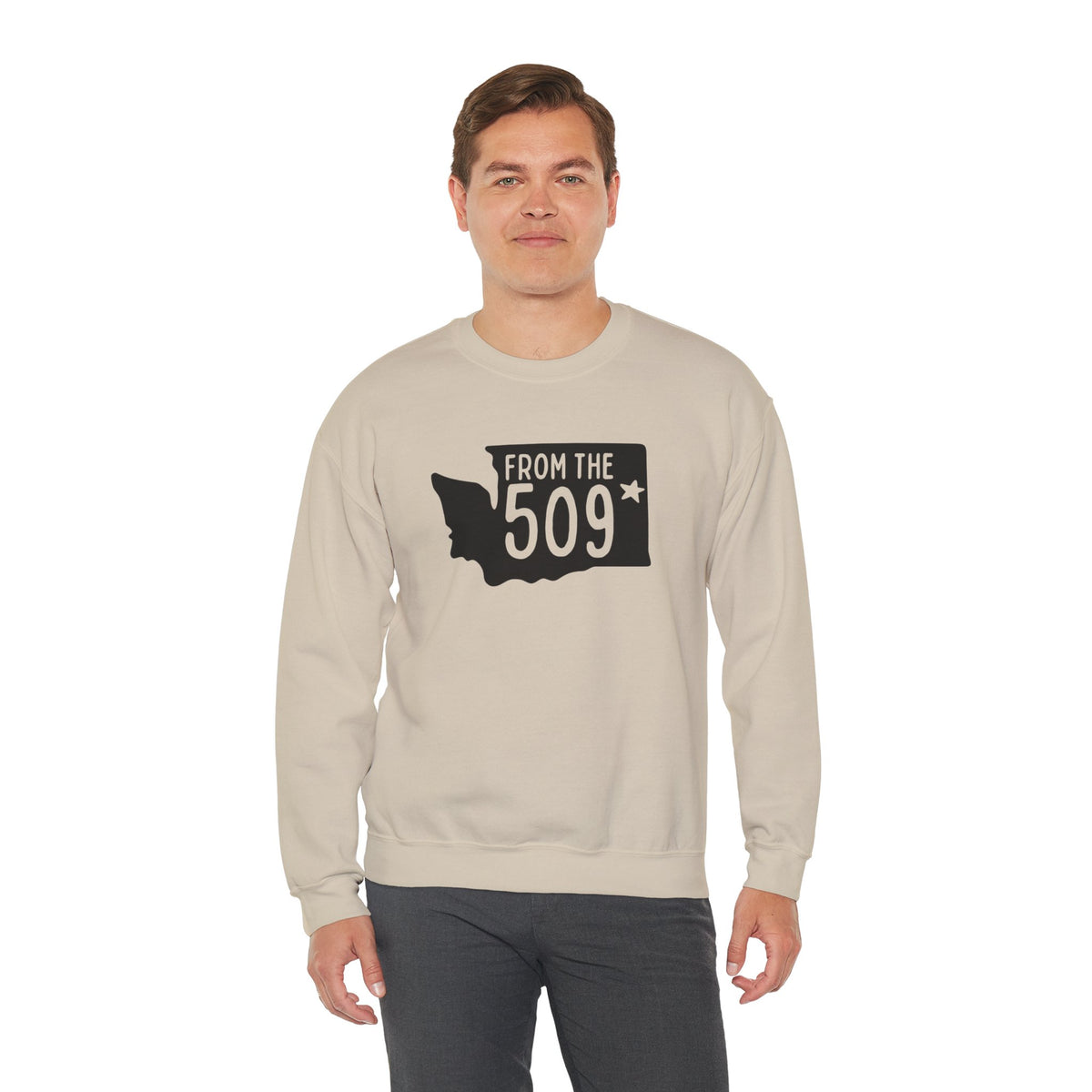 Man wearing From the 509 Spokane sweatshirt with Washington state silhouette and star marking Spokane.