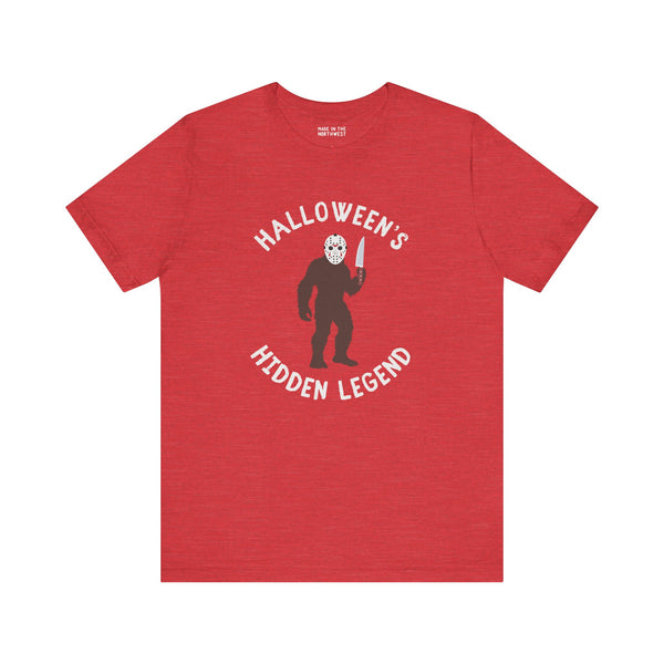 Halloween's Hidden Legend Bigfoot tee featuring creature in Jason mask with a knife, perfect for spooky season.