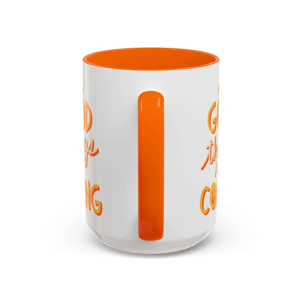 Good Things Are Coming Mug with vibrant orange interior and cheerful lettering.