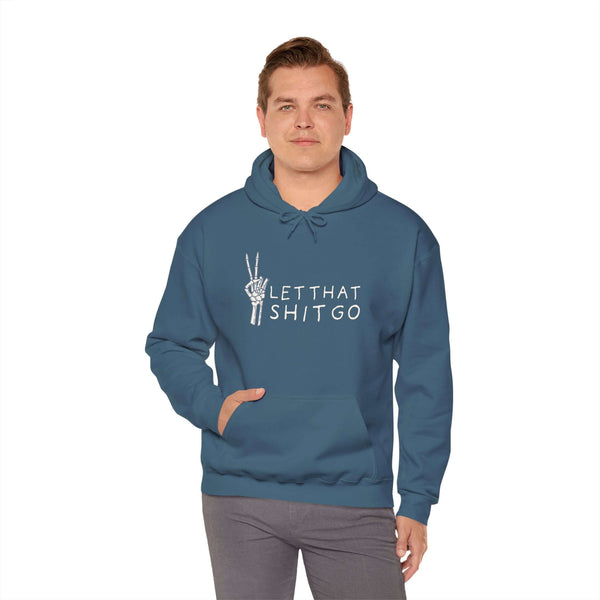 Man wearing Let That Shit Go Skeleton Hoodie with peace sign design, promoting relaxation and stress-free living.