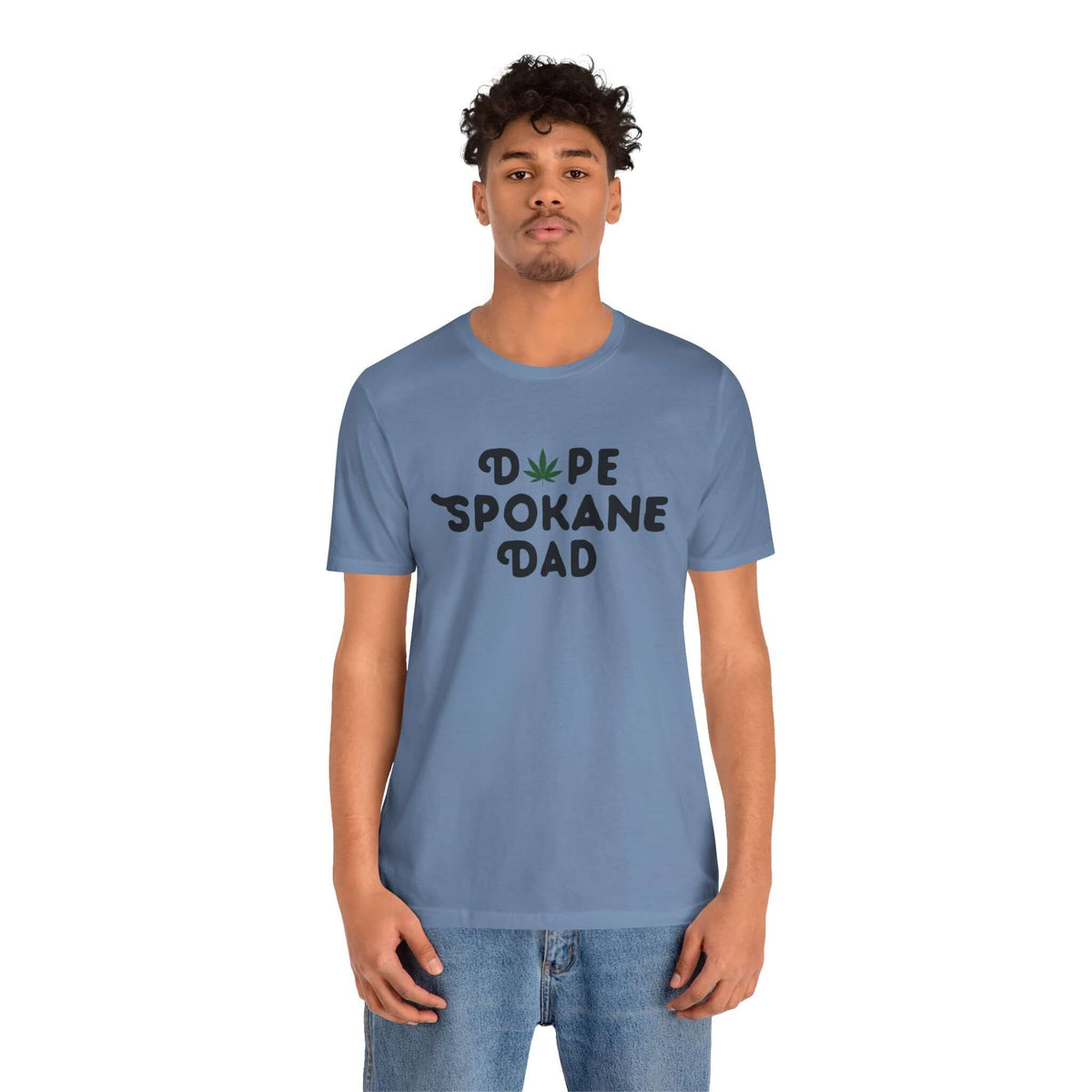 Man wearing a blue "Dope Spokane Dad" tee with a marijuana leaf design.