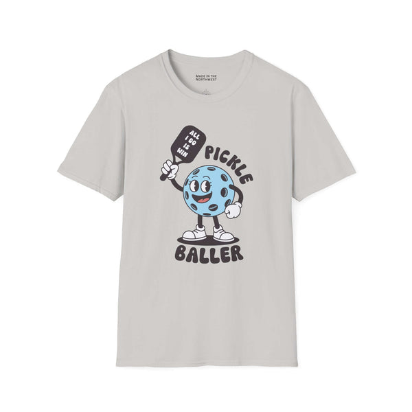 Pickle Baller T Shirt featuring a playful blue pickle character with a racquet and cheeky caption.
