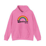 Pink hoodie with rainbow design and 'Spokane Pride' text, celebrating LGBTQ+ inclusivity and community spirit.