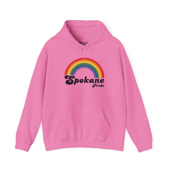 Pink hoodie with rainbow design and 'Spokane Pride' text, celebrating LGBTQ+ inclusivity and community spirit.