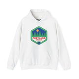 Portland Oregon retro hoodie with 90s-inspired badge featuring trees, sun, and blue sky, representing urban and natural beauty.