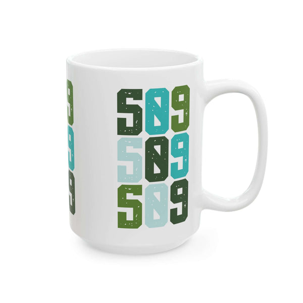 Five-Oh-Nine Pop Spokane ceramic mug featuring colorful stacked design celebrating 509 pride.