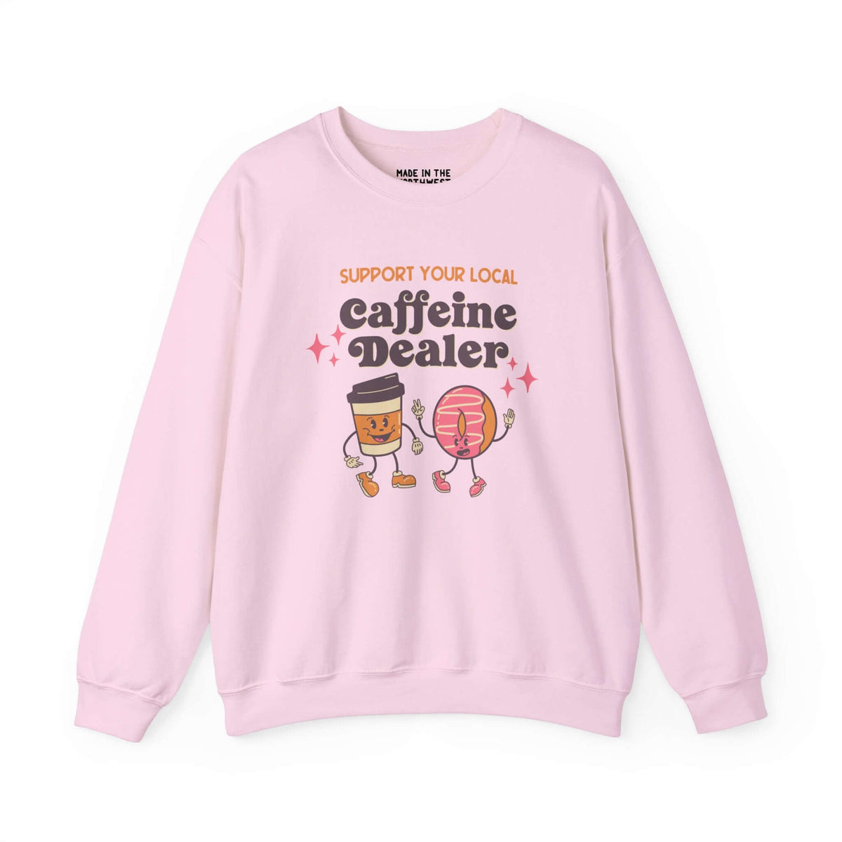 Pink sweatshirt with "Support Your Local Caffeine Dealer" printed, featuring cartoon coffee cup and donut characters.