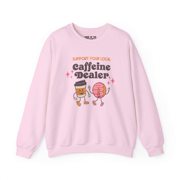 Pink sweatshirt with "Support Your Local Caffeine Dealer" printed, featuring cartoon coffee cup and donut characters.