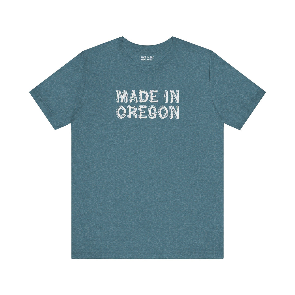 Premium soft tee featuring 'Made in Oregon' in rustic log font, perfect for outdoor enthusiasts.