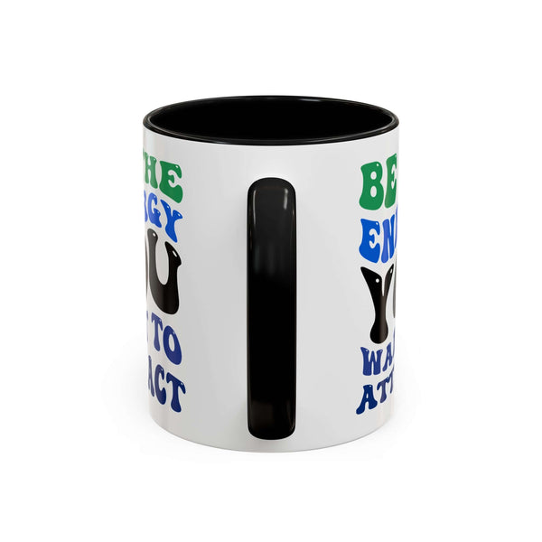 Be the Energy You Want to Attract Mug with colorful typography and black interior, perfect for daily inspiration.