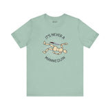 Mint green tee featuring graphic text 'It's Never a Mannequin' and cartoon mannequin, perfect for true crime fans.