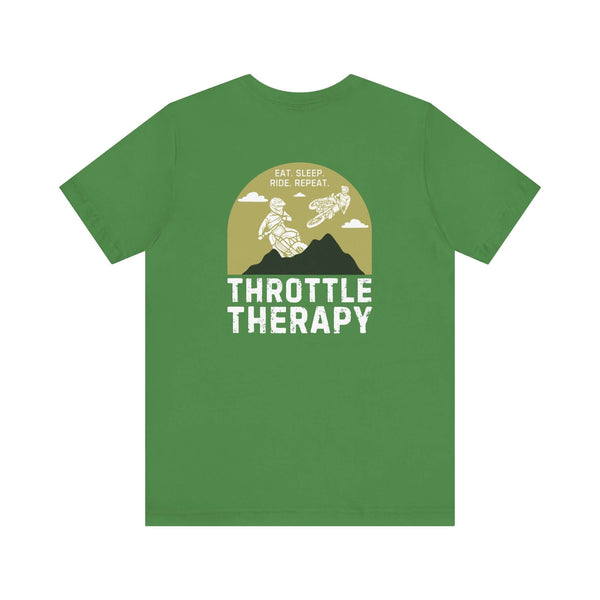 Green "Throttle Therapy" tee with dirt bikers and mountain backdrop, perfect for motocross enthusiasts seeking adventure.