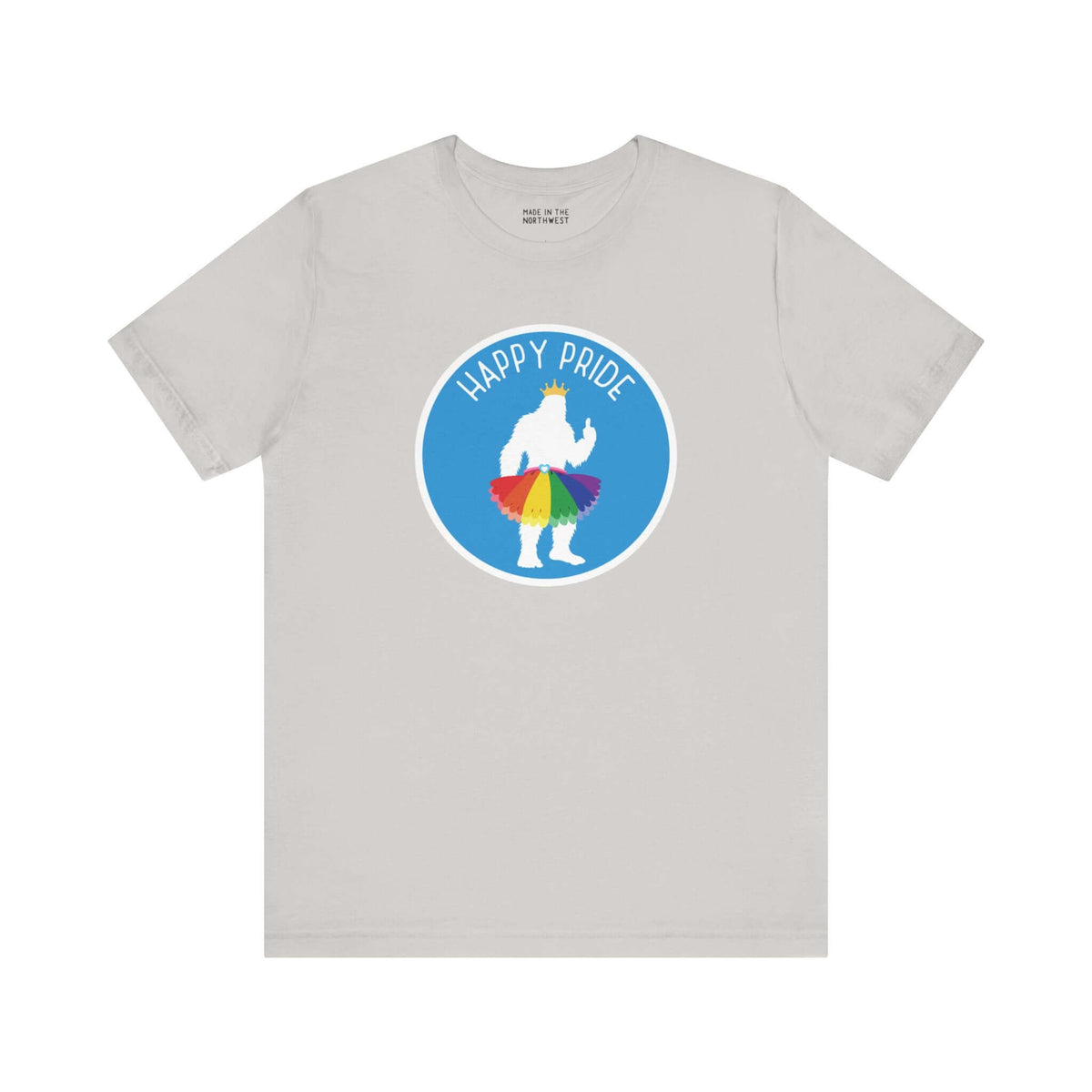 Bigfoot's Pride Parade tee with silhouette and rainbow tutu, featuring "Happy Pride" text on a light gray shirt.