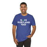 Man wearing blue Dope Portland Dad tee with marijuana leaf detail, expressing cool and laid-back style.