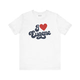 I love Eugene t shirt featuring cursive design and heart graphic in red on a white tee
