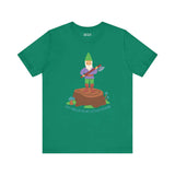 Green tee featuring a gnome with an axe on a stump, text 'Say hello to my little friend', mixing humor and bold style.