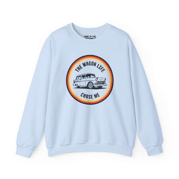 Light blue sweatshirt featuring vintage Chevy Nomad design with text 'The Wagon Life Chose Me'.