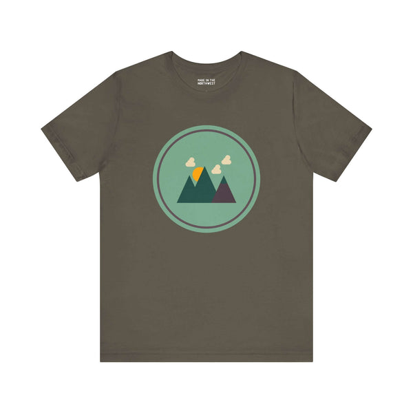 Olive green t-shirt with minimalist mountain and clouds design in a circle, inspired by the Pacific Northwest.