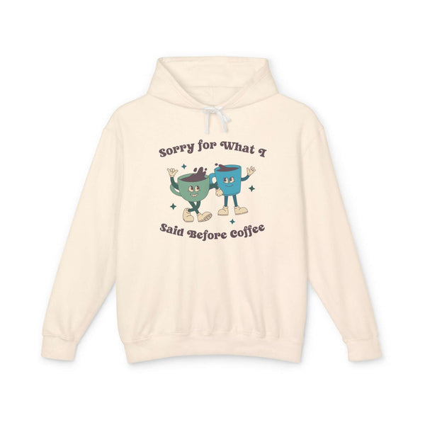 Sorry for What I Said Before Coffee hoodie featuring playful coffee cup graphics, perfect for coffee lovers.
