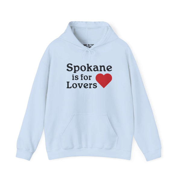 Light blue hoodie with "Spokane is for Lovers" and red heart, celebrating Spokane pride and the beauty of the Inland Northwest.