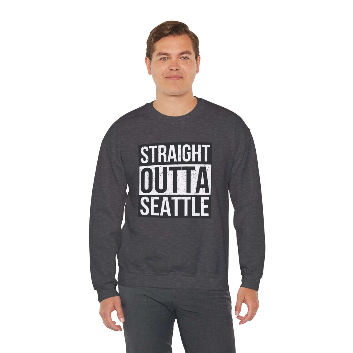 Man wearing "Straight Outta Seattle" sweatshirt, dark gray, local pride streetwear inspired by "Straight Outta Compton" design.