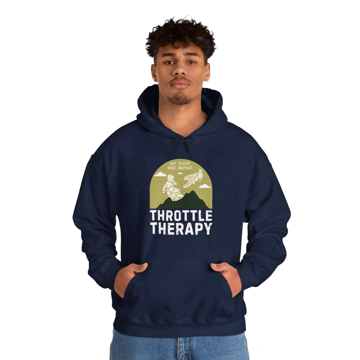 Man wearing Throttle Therapy hoodie with dirt biker graphic and mountain backdrop design. Perfect for motocross enthusiasts.