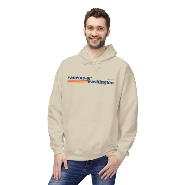 Retro Vancouver Hoodie displayed by a smiling man, featuring minimalist Vancouver Washington graphic and retro stripes.